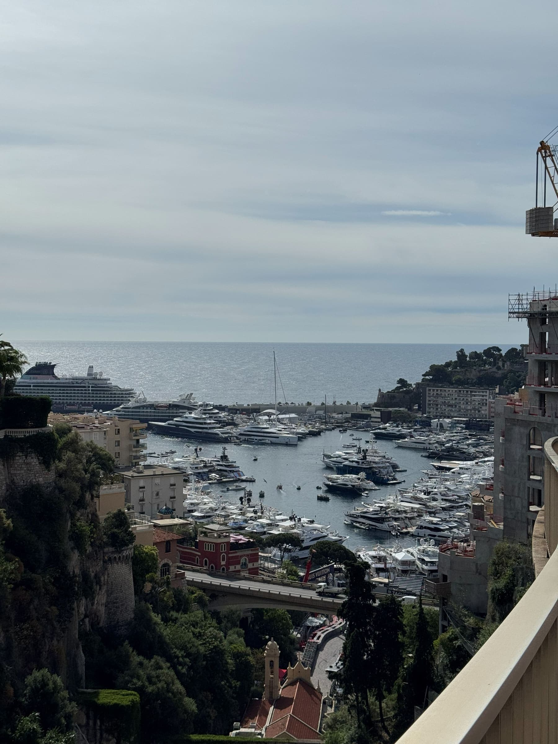 Port Hercule with superyachts and the Rock of Monaco behind