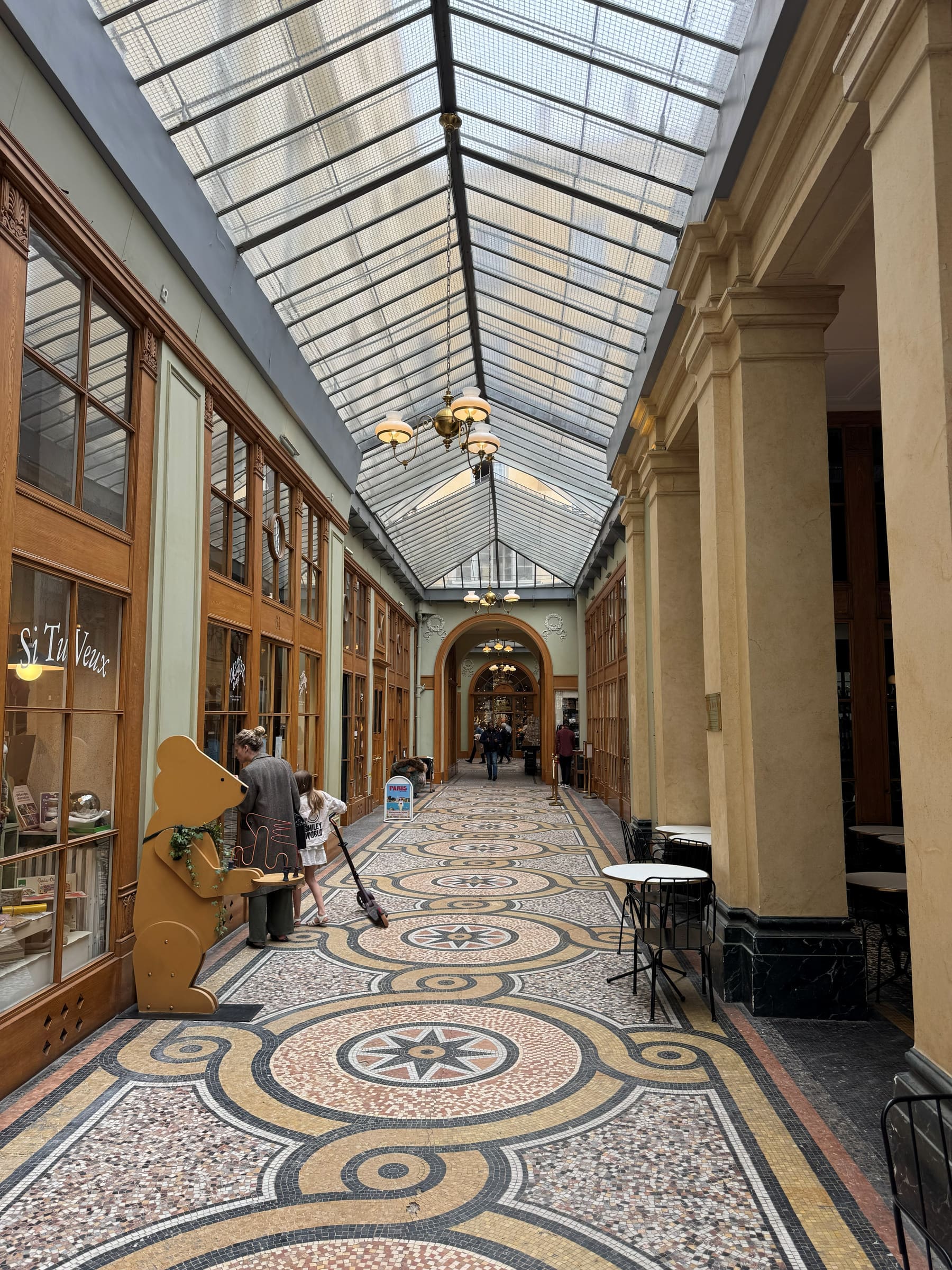 A covered passage with mosaic floor in Paris