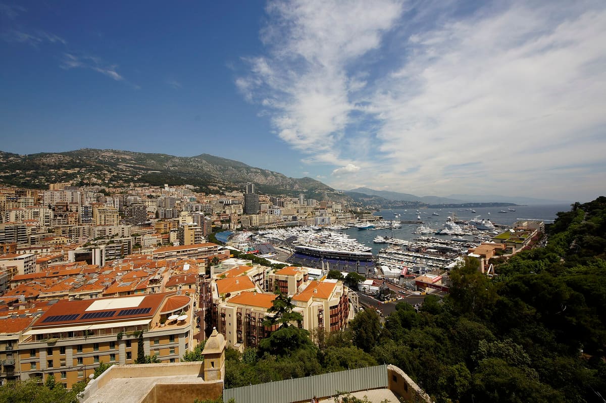 Monaco harbour full of yachts seen from high above the old town rooftops on Grand Prix weekend